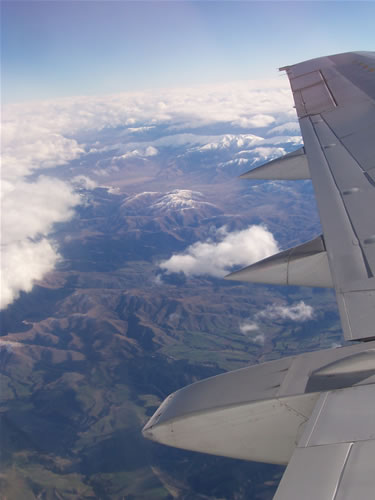 L'avion avec le hublot au dessus de la nouvelle-zélande